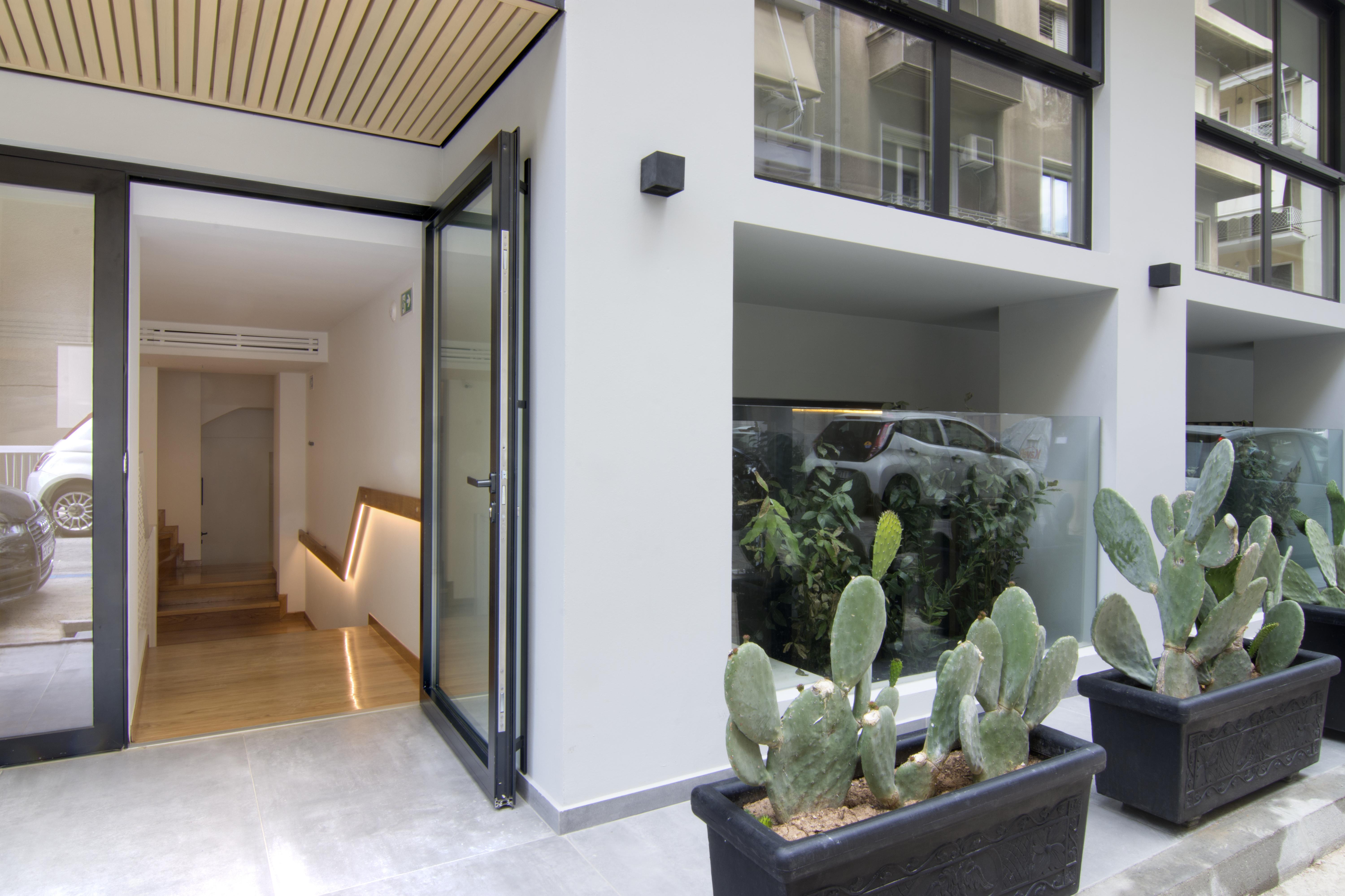 Hotel Coco-Mat Athens Jumelle Exterior foto The entrance of the house