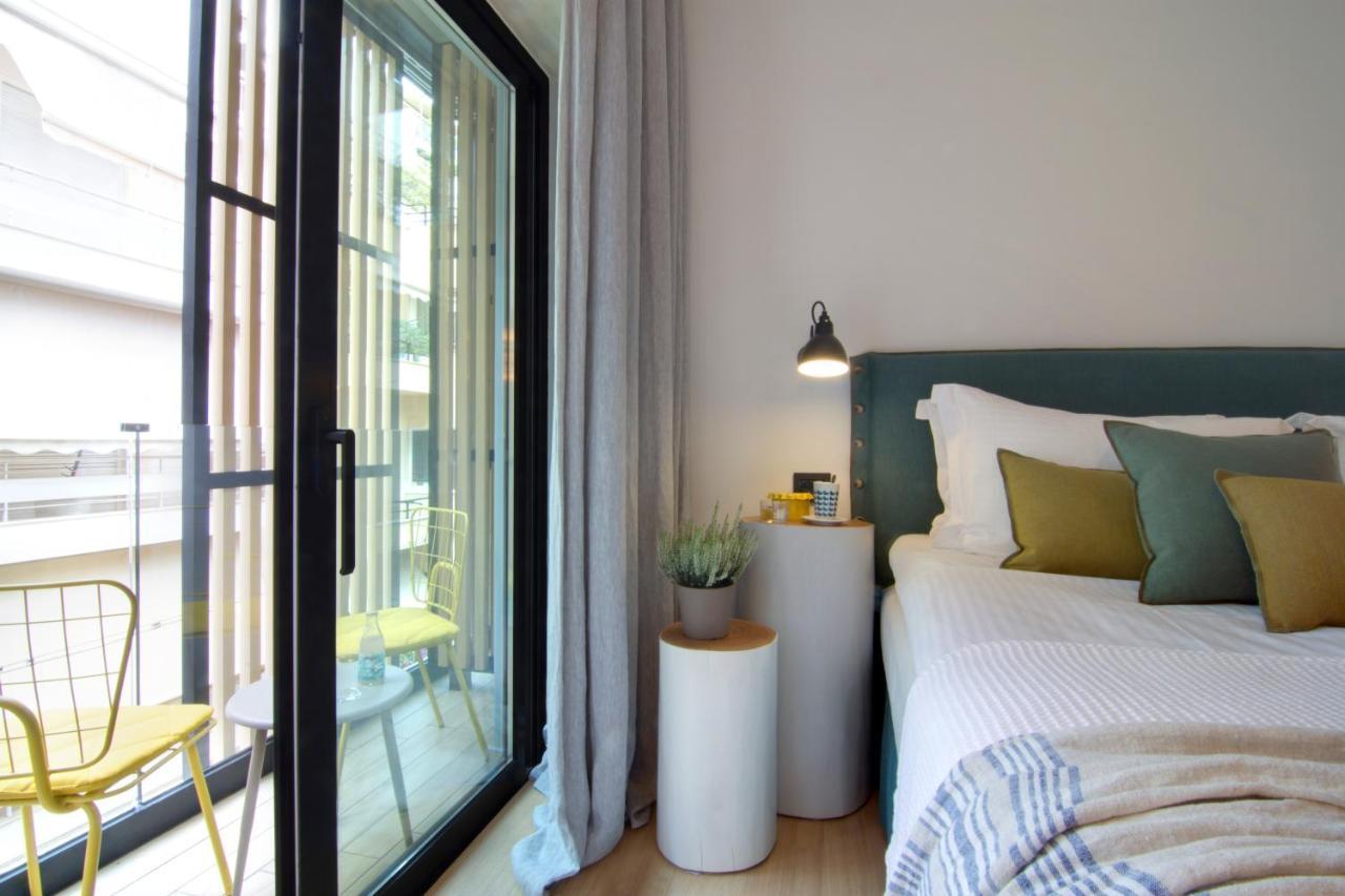 Hotel Coco-Mat Athens Jumelle Exterior foto A bedroom at the hotel