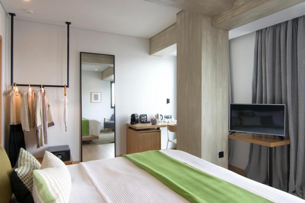 Hotel Coco-Mat Athens Jumelle Exterior foto A room at the hotel